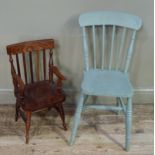 A pale blue painted kitchen chair with concave back saddle seat on turned legs joined by stretchers;