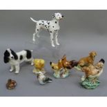 A collection of ceramic and resin animals including, hens and chicks, Sylvac Dalmatian, Melba ware