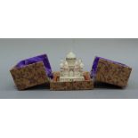 An alabaster model of the Taj Mahal in a fitted box, approximately 9cm high