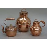 Two copper jersey jugs, 22cm high and 15cm high, together with a small copper kettle 16cm high
