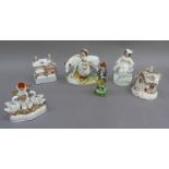 A Staffordshire group of milk maid and cow, girl with sheep, swan spill vase, musician (missing