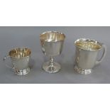 Two George V christening cups, Sheffield 1931 and Birmingham 1929 and a commemorative cup,