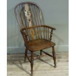 A 19th century ash and elm high back windsor elbow chair with pierced splat (a/f) dished seat on