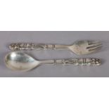 GEORG JENSEN, DENMARK, a pair of .925 Sterling silver salad servers, the handles cast with seed pods