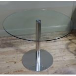 A modern glass topped dining table on cylindrical chromed pillar and circular base, 100cm diameter
