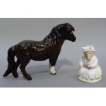 A Royal Doulton figure of a Shetland pony, brown with white socks, boxed, 14cm, together with a