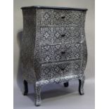 A modern black and silver four drawer chest decorated overall with quatrefoils and scrolls, 53cm