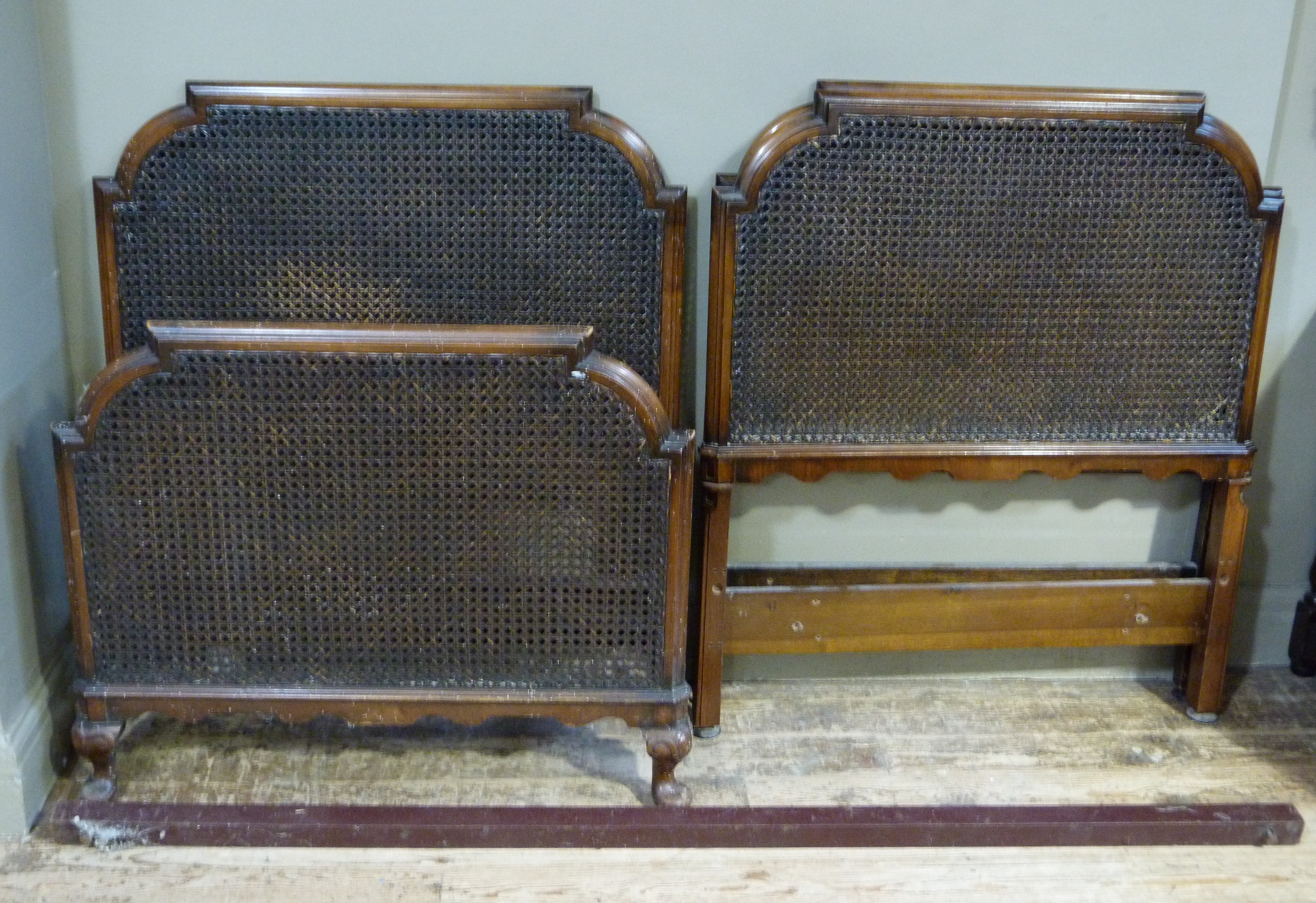 A pair of bergere head and base boards for single beds, stained beech frames, each approximately