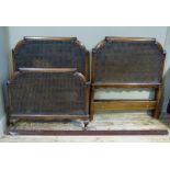 A pair of bergere head and base boards for single beds, stained beech frames, each approximately