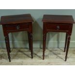 A pair of mahogany single drawer side tables on turned tapered legs, 50cm wide
