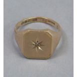A signet ring in 9ct gold c.1964, the octagonal head star set to the centre with a small rose cut