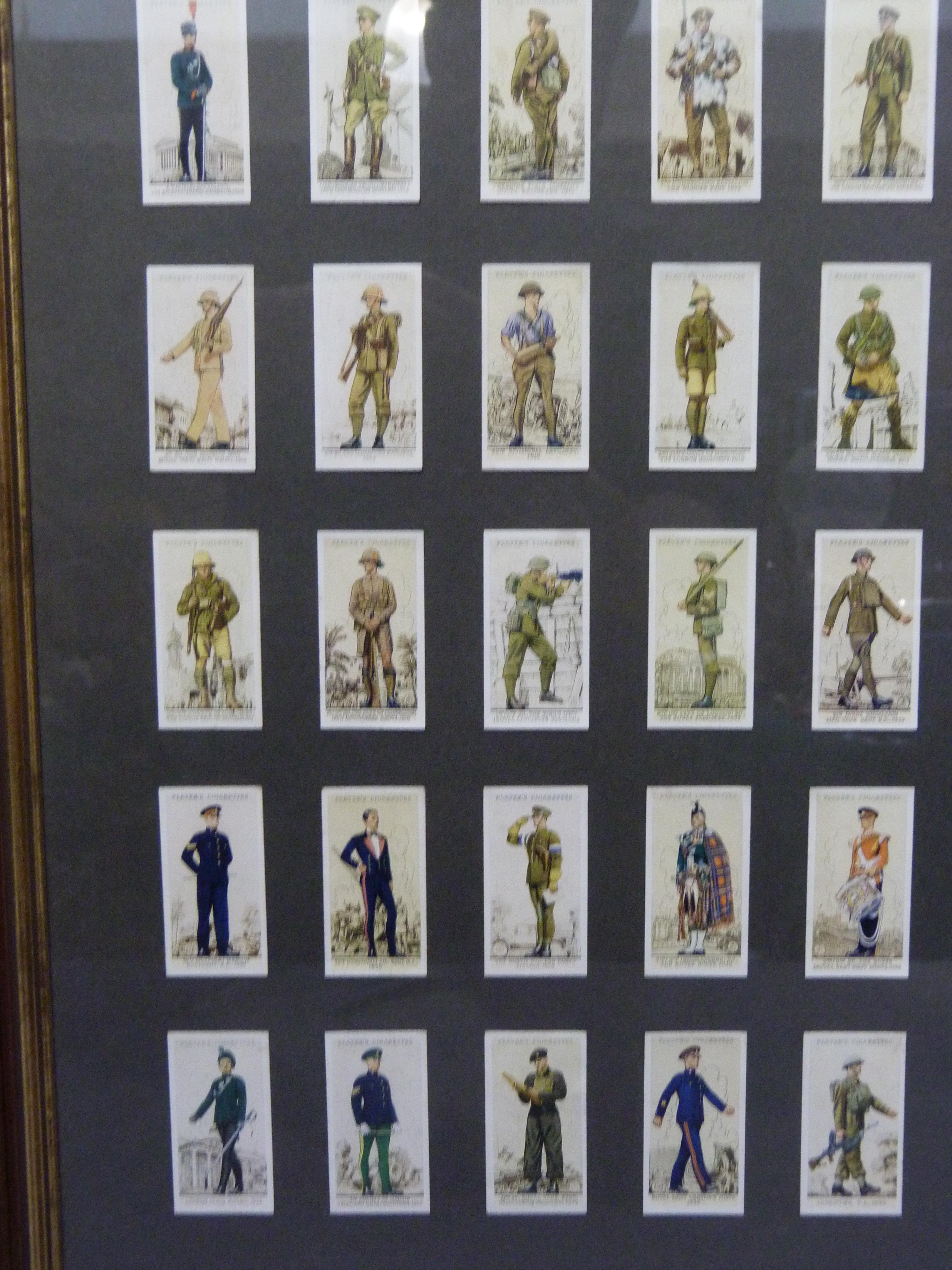 A set of Players cigarette cards, British army uniforms, fifty displayed and framed in two frames; - Image 3 of 3