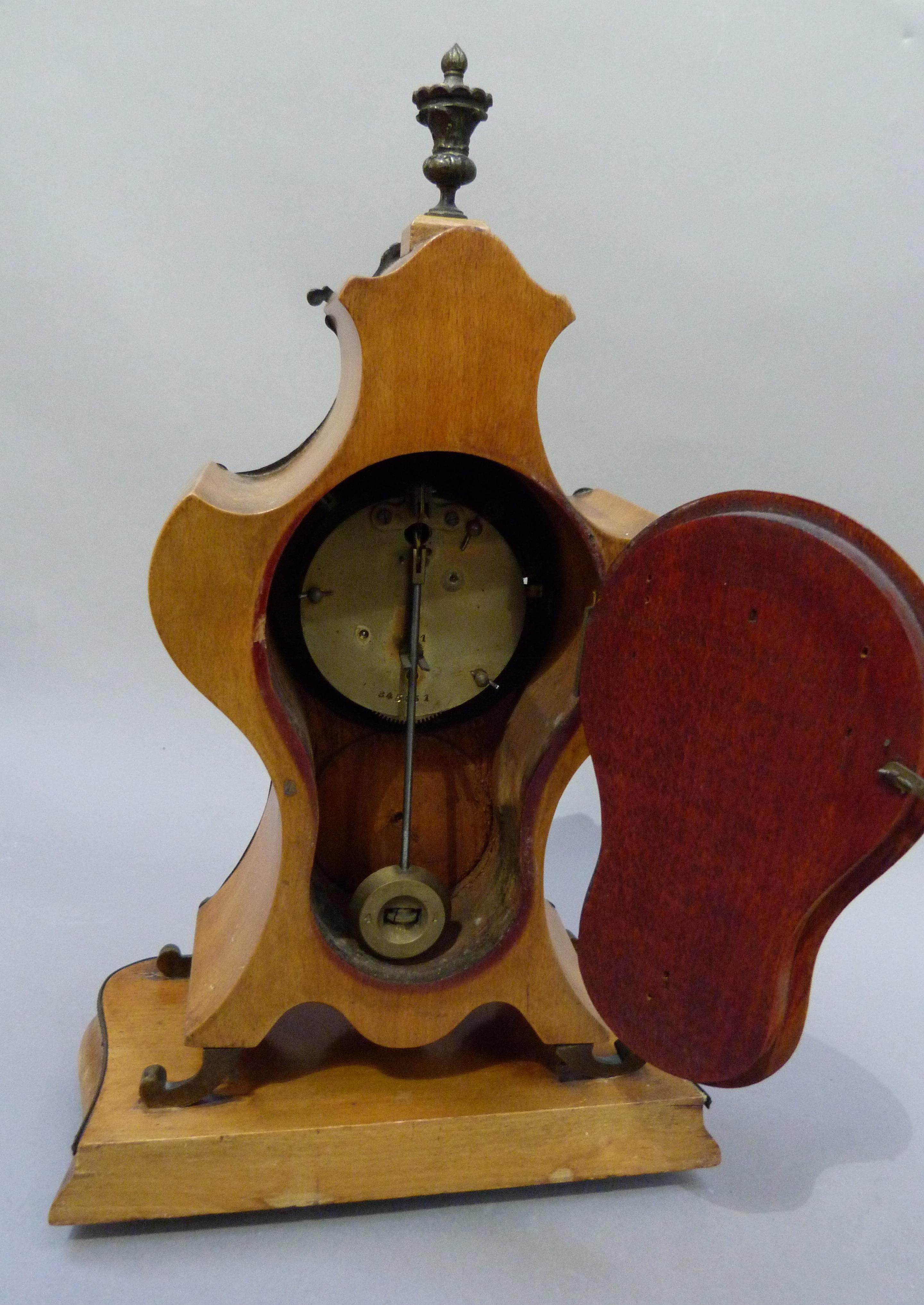 A Rococo style mantel clock in polished beech the front panel veneered with birds eye maple - Image 2 of 3