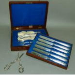 A set of six Victorian fish knives and forks, silver plated with vine leaf engraving to blades and