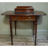 An Edwardian mahogany desk with super structure and bowed writing surface with pair of D-shaped