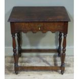 A Victorian oak Jacobean revival single drawer table with rectangular top with foliate lip, the