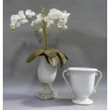 A reproduction white glaze two handled urn-shaped planter, 26cm high; together with another similar,