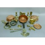 A quantity of brass and copper items including, walking stick horses head, furniture mounts, pestle,