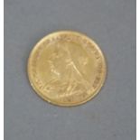 A Victorian 1899 veil head half sovereign