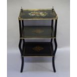 A late Victorian ebonised three tier etagere with three quarter brass gallery the top inlaid in
