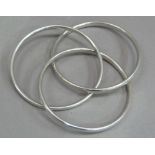 Three interwoven bangles in silver c.1990, approximate weight 90gm