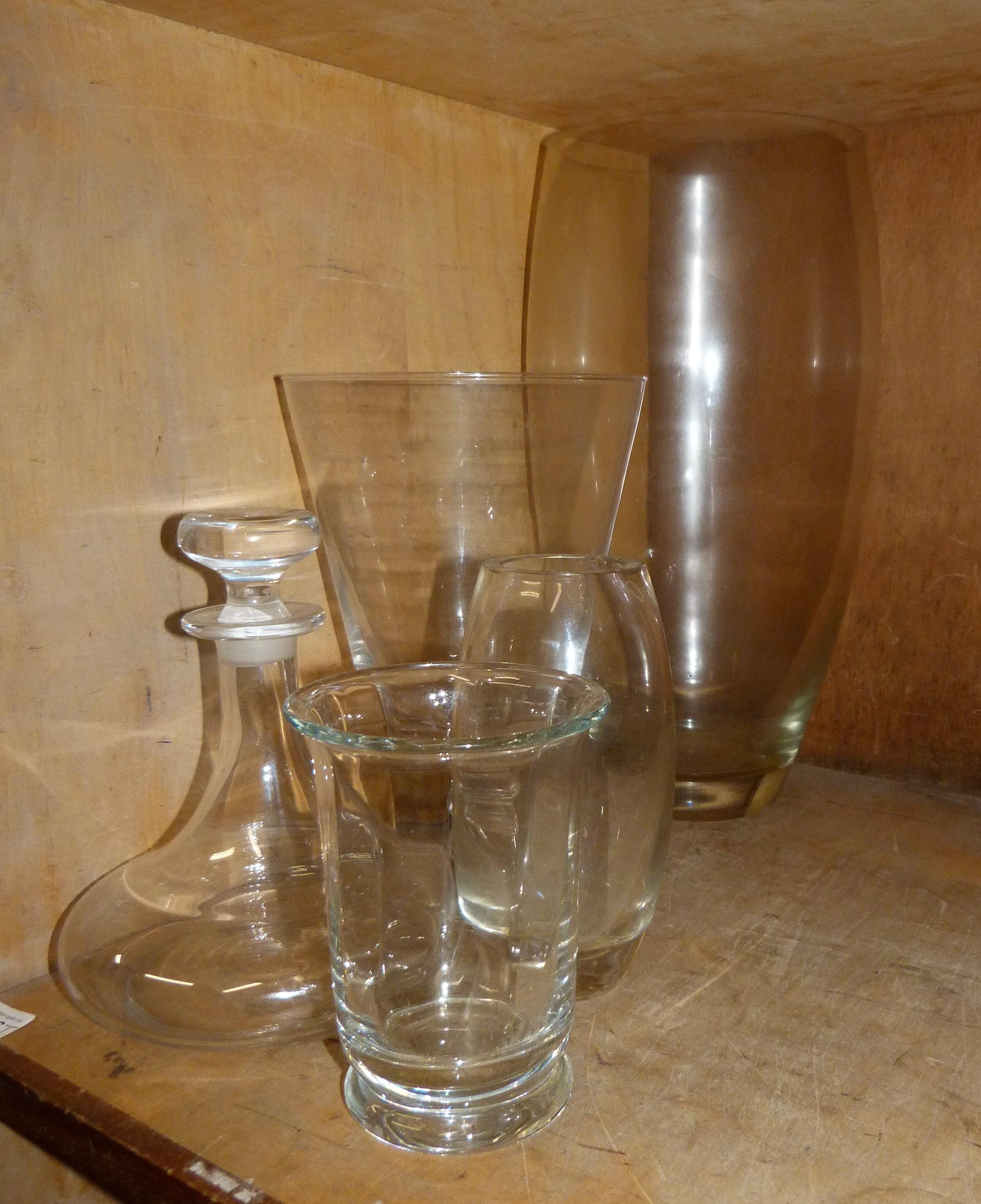 A large glass vase, 43cm high, a large goblet shaped vase, 28cm high, a ships decanter, an ovoid