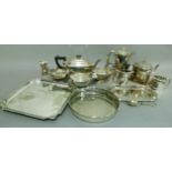 A three piece Art Deco style silver plated tea service with ebonised fittings; a EPNS shaped