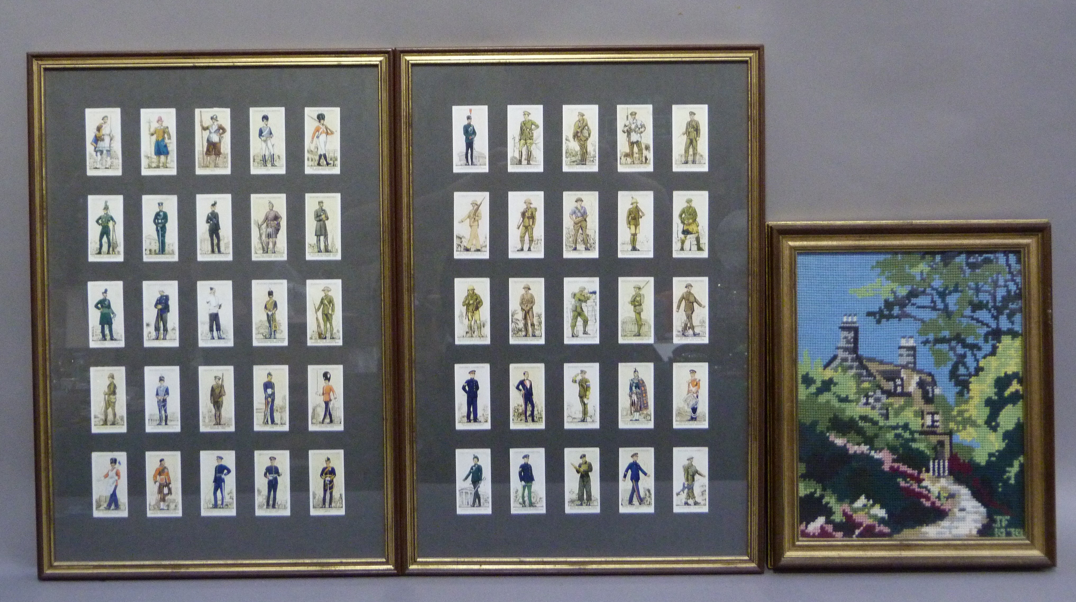 A set of Players cigarette cards, British army uniforms, fifty displayed and framed in two frames;