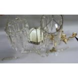 Two basket chandeliers hung with prismatic drops, an opaque panel and gilt metal light shade and a