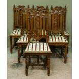 A set of six late Victorian/early Edwardian oak dining chairs of Jacobean revival style with grape