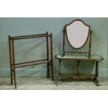 A mahogany shield shaped toilet mirror, a mahogany towel rail and a coffee table on lyre supports