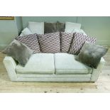 A pair of Barker and Stonehouse three seater sofas in oatmeal fabric with scatter cushions