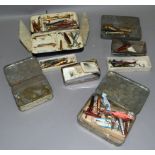 A quantity of fishing lures contained within a variety of tins, one by Hardy Brothers limited makers