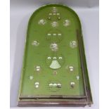 A Master Corinthian bagatelle board, 1951 model, green painted with steel balls, 72cm long approx,