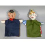 A pair of painted celluloid punch and policeman hand puppets with felt and cotton bodies, 26cm