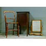A mahogany bedside cupboard, a beech rectangular toilet mirror and a Victorian bedroom chair