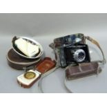 A Zeiss Ikonta camera with Prontor svs Novar Anastigmat 1:3.5 F=75MM lens, in fitted leather case;