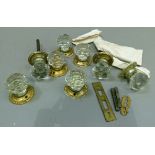 Four pairs of Victorian cut glass door handles with gilt metal collars