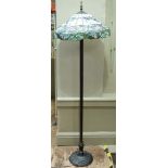 A Tiffany style glass standard lamp in shades of off white, pink and green, approximately 165cm high