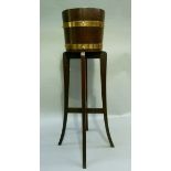 Early 20th century oak and copper bound barrel planter on stand