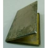 A silver cigarette case of engine turned decoration London 1938, approximately 6oz
