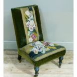 A Victorian nursing chair with the original tapestry and velvet upholstered back and seat on