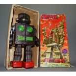 A Japanese tin plate battery operated Attacking Martian, in original box