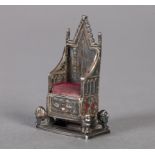 An Edward VII miniature silver coronation throne pin cushion, Birmingham 1902, maker L&S, 4cm high