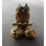 A turquoise owl brooch in 9ct yellow and white gold c.1987, in half relief perched on a white gold