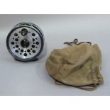 A JW Young and Sons limited Beaudex fly reel with black japanned pierced aluminum spool and foot