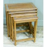 A nest of four hardwood occasional tables of chinoiserie design