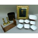 A red glazed serving bowl and six small bowls, oven to tableware and a carved and pierced book