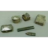 Four continental .925 standard silver pill boxes of rectangular twin lidded and oval outline and