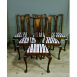 A set of six polished beech and satinwood inlaid Queen Anne style dining chairs with pierced